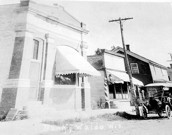 Vintage photo of Waldo State Bank with a car in the front of the bank