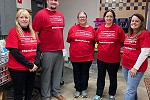 Waldo State Bank employees volunteering at a food pantry during Power of Community Week